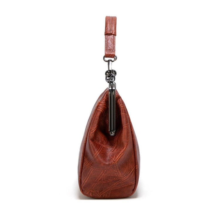 Rafaela – Retro Clamshell Handbag